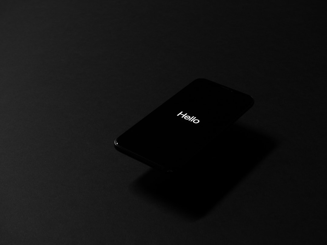 A dark phone screen resting on a surface. The Pulsyn app does not send data to remote servers, meaning there is no backend infrastructure tracking your biometric activity.