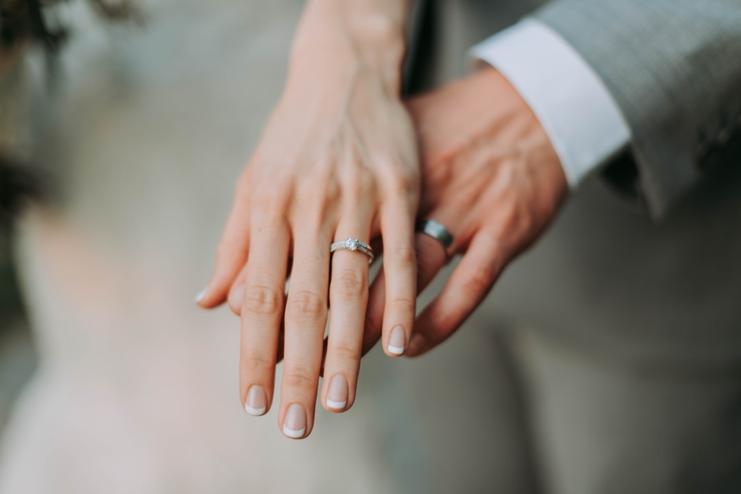A close-up of a hand wearing a sleek ring, showing the physical device that must be worn consistently for the calibration algorithm to build an accurate personal baseline
