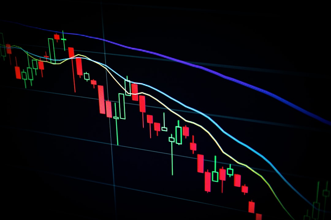 A stock market trading floor with monitors showing volatile charts, symbolizing the uncertainty around Oura's IPO valuation