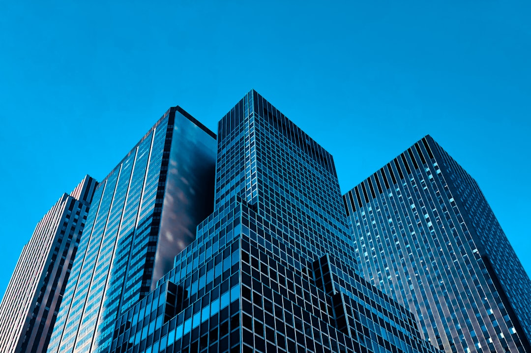 A modern glass corporate headquarters building, representing the institutional investors who will scrutinize Oura's business model