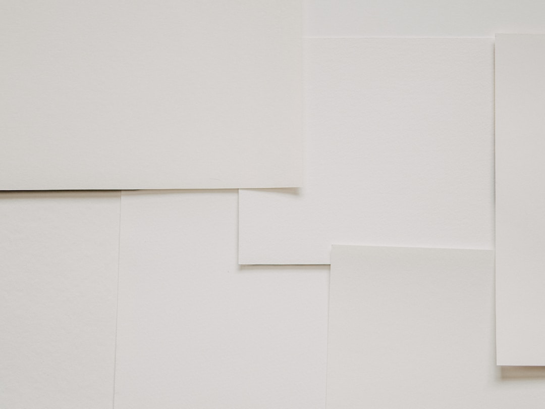 A clean white minimalist surface, the visual opposite of a complicated billing statement with multiple recurring charges