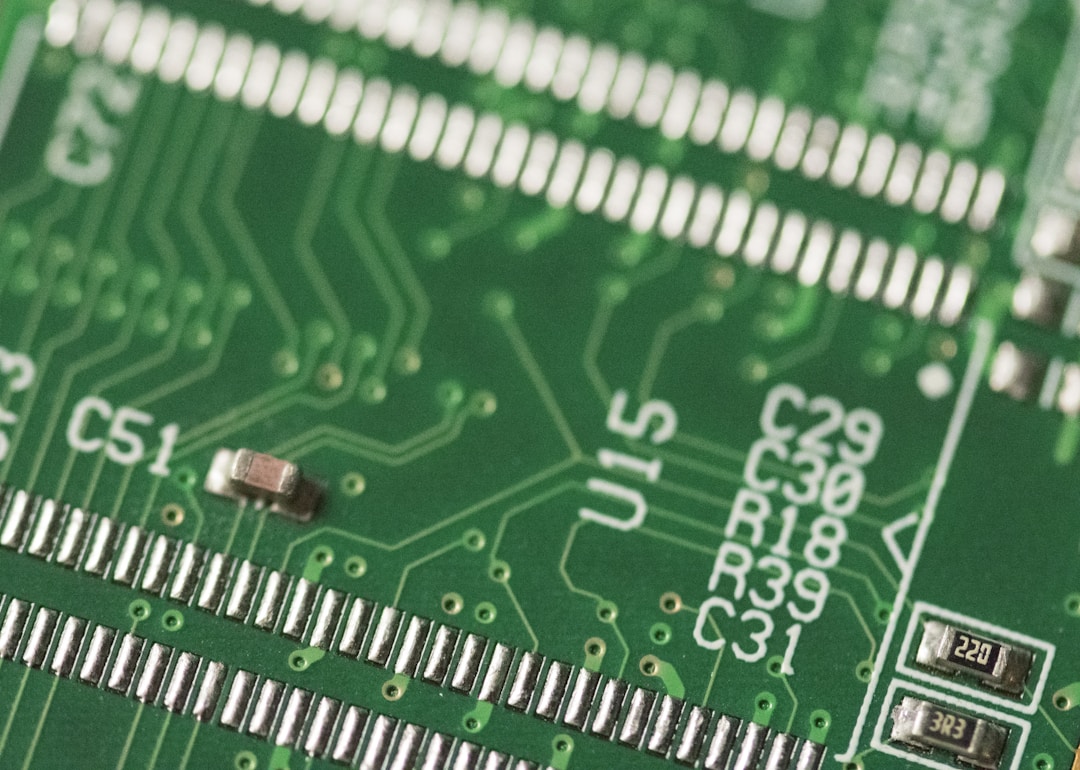 A factory floor with automated PCB assembly machines : where $30 of parts become a sealed wearable that retails for ten times the component cost