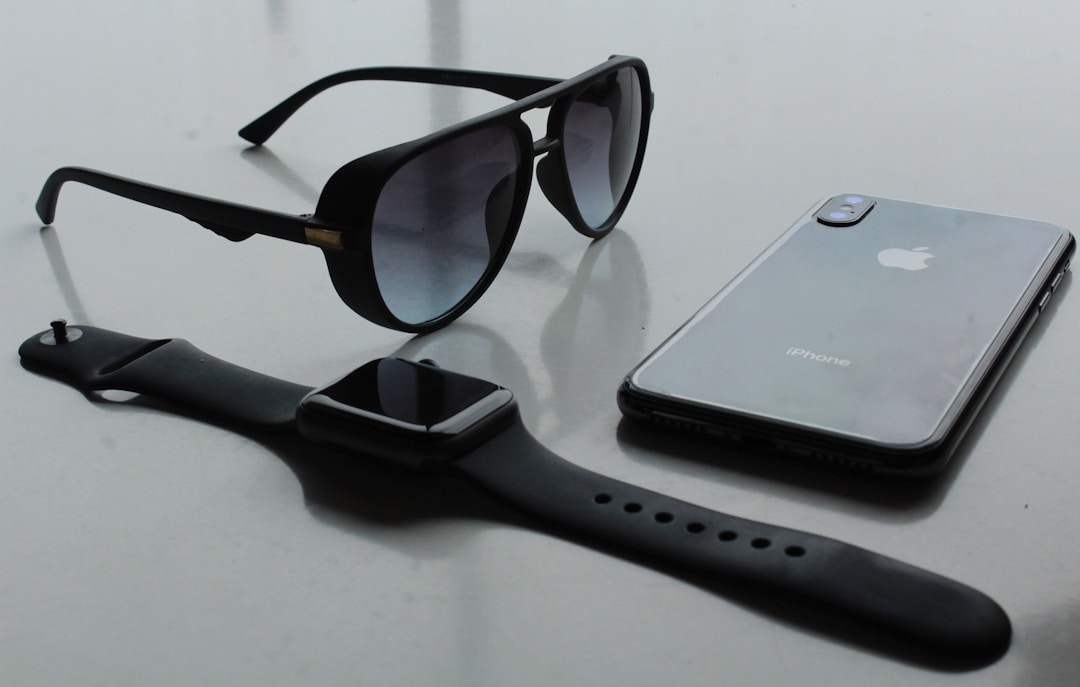 Smartwatch and wearable devices on a dark surface