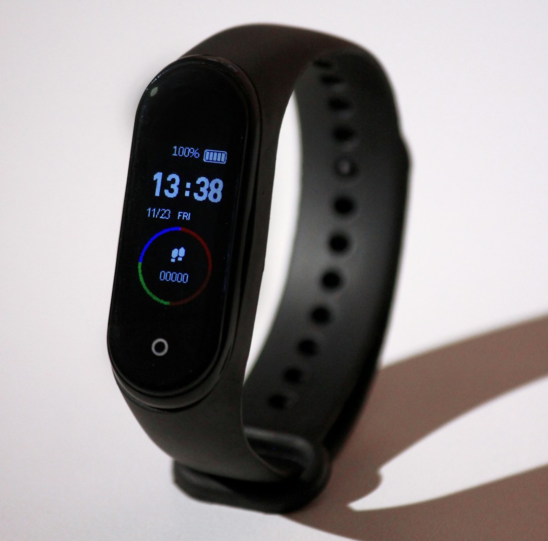 An old fitness tracker left in a drawer, its screen dark and strap cracked. The kind of device that still works but has nowhere to sync to anymore.