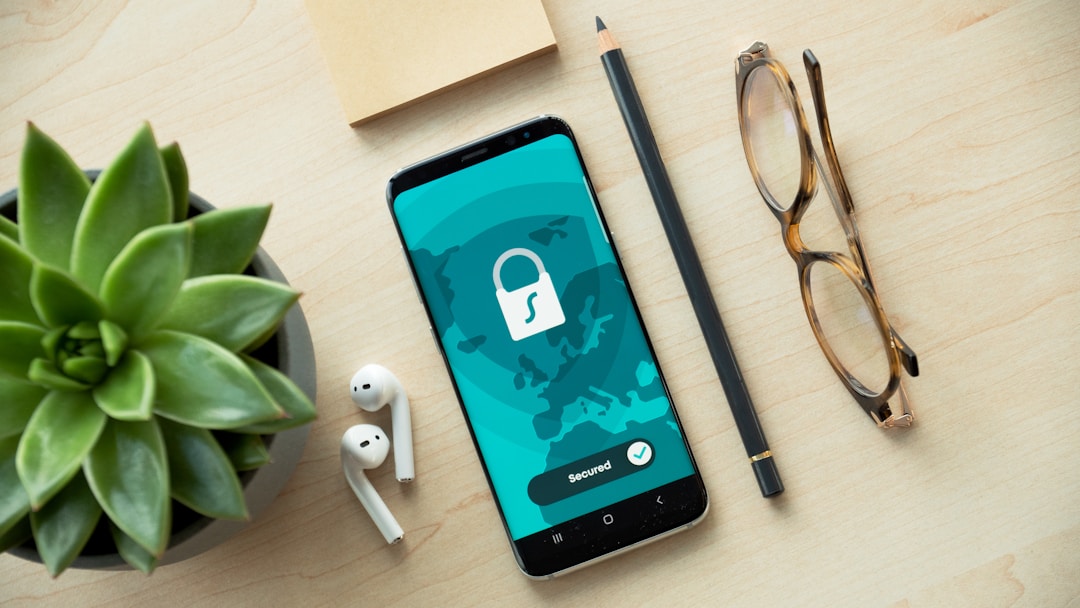 A phone with a lock screen, sitting on a desk. The device that actually stores your health data, not a server farm in another state.