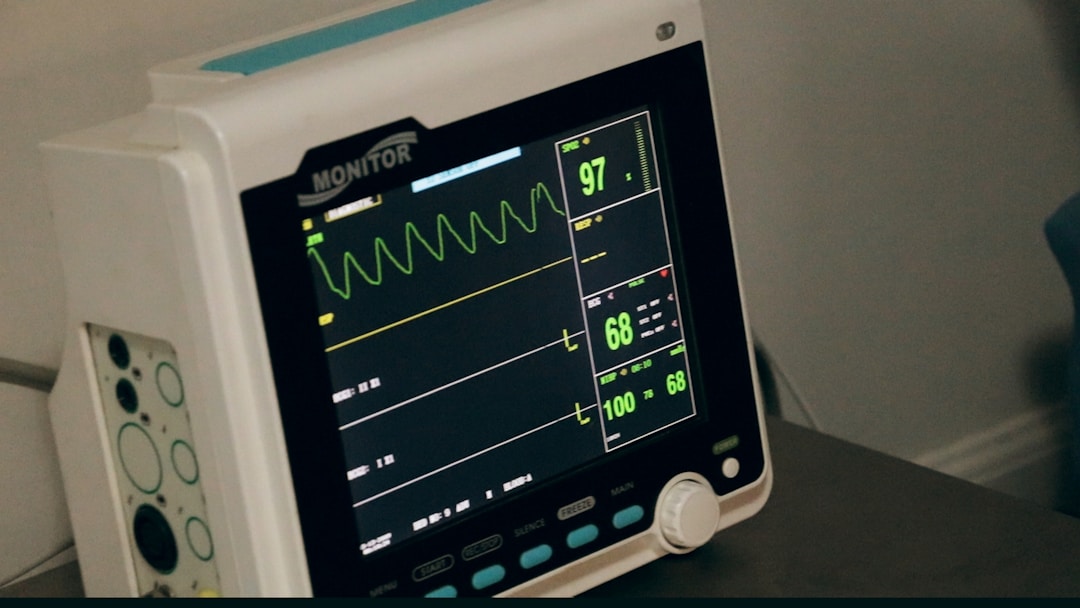 A medical electrocardiogram monitor showing heart rhythm data, representing the raw physiological signal behind HRV analysis