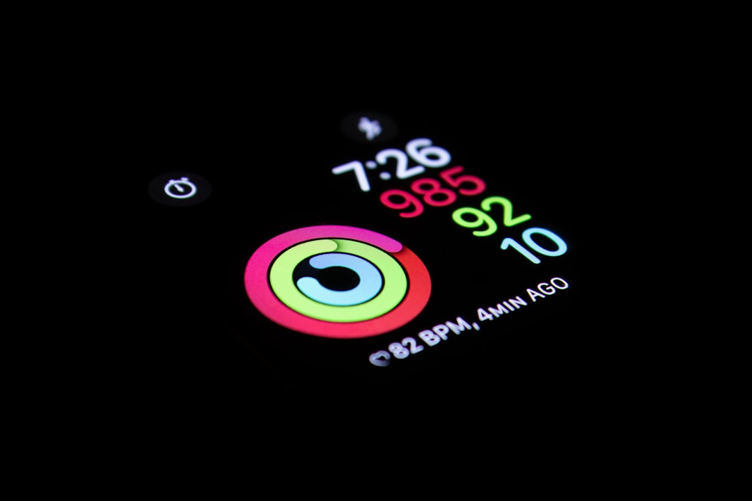 A wristband fitness tracker on a runner's arm. These devices are accurate for heart rate but the Stanford study showed none could measure energy expenditure correctly.