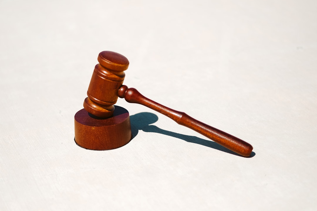A gavel resting on a courtroom bench, representing how digital health data from fitness trackers is now routinely admitted as evidence in legal proceedings