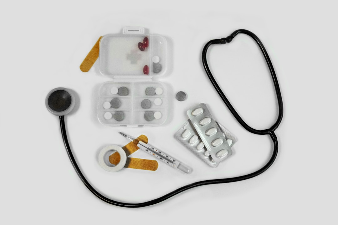 A stethoscope on a desk with medical documents, showing the regulatory gap between a wellness device and a clinically validated medical device